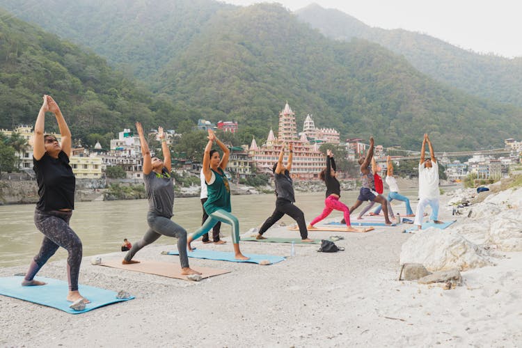 Photograph Of People Doing Yoga