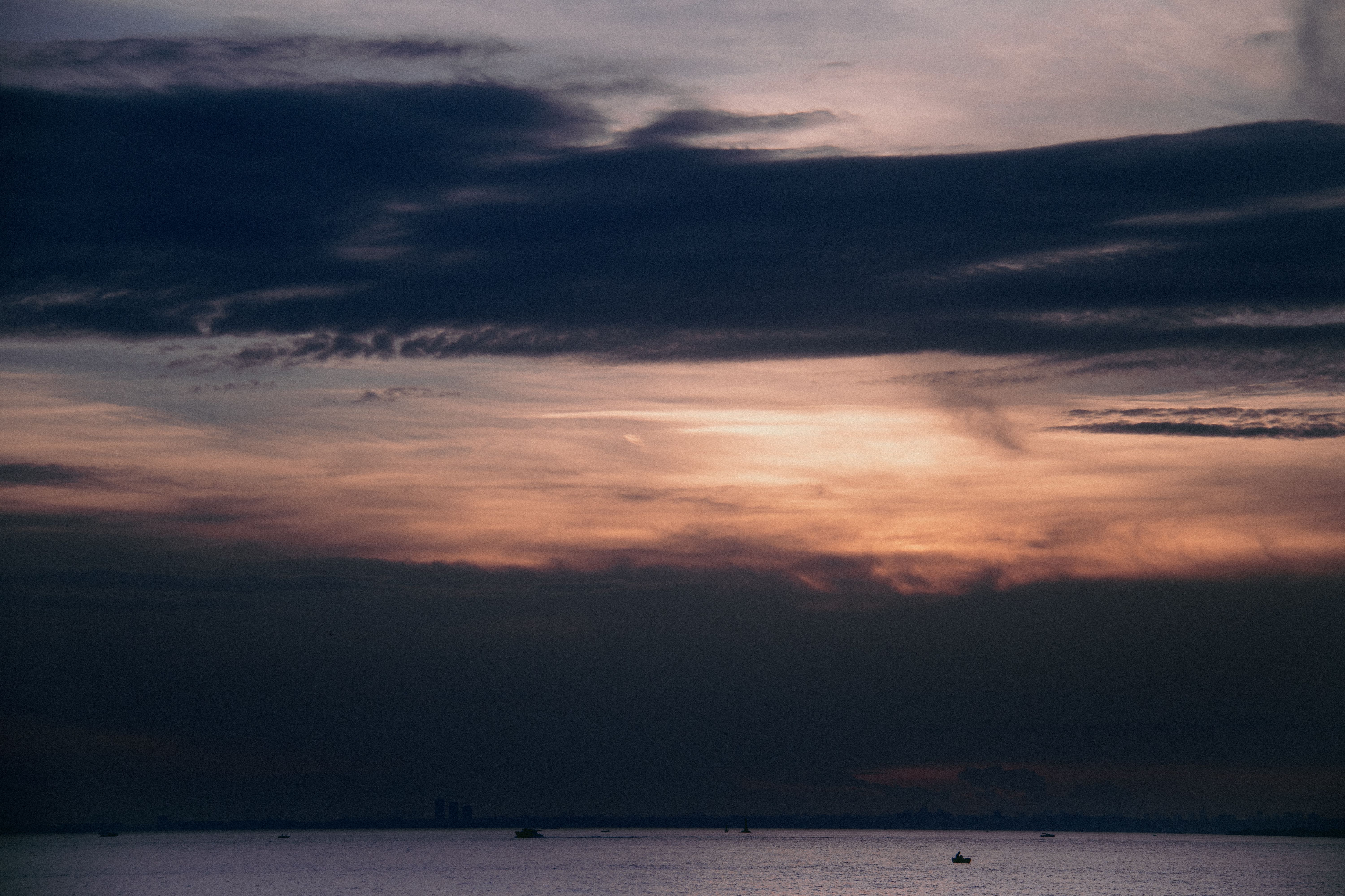 Photograph Of Clouds Above A Sea Free Stock Photo