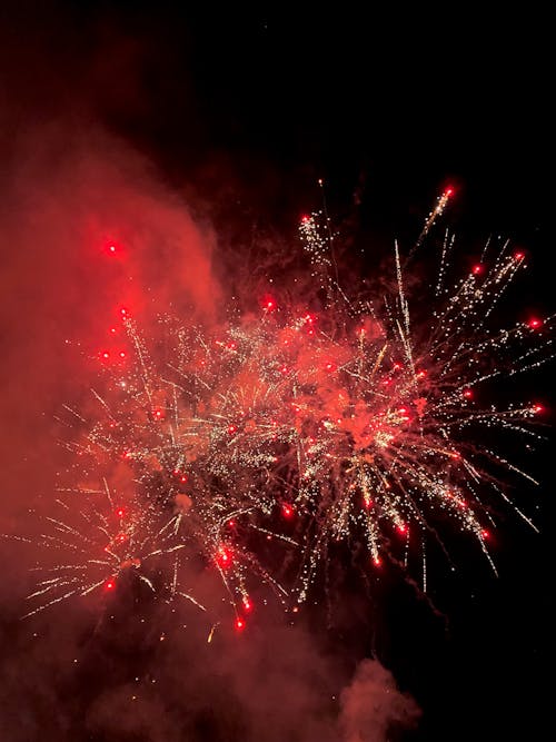 Red Fireworks on Dark Sky