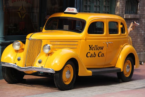 araba, sarı, taksi içeren Ücretsiz stok fotoğraf