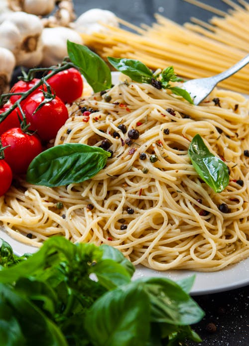 Foto profissional grátis de alimento, comida italiana, espaguete