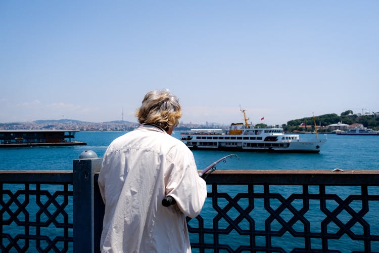 Man Fishing On The Pier