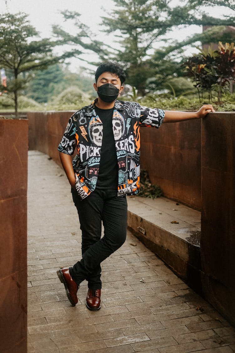 Man In Printed Shirt Wearing Black Facemask