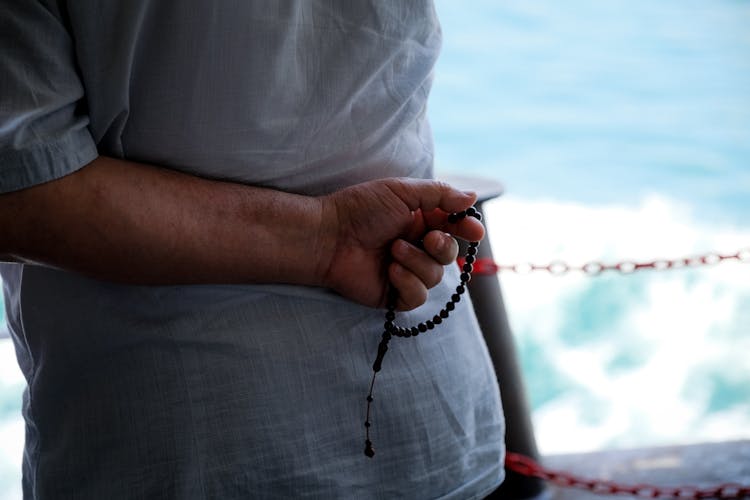 Hand Holding Rosary