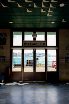 Sunlit entrance of Üsküdar ferry line, offering a scenic view of the Bosphorus waterfront.