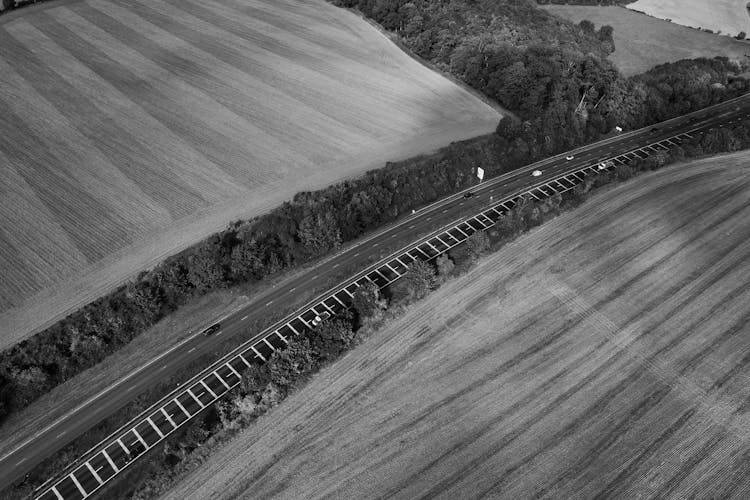 Aerial View Of Roads Between Croplands