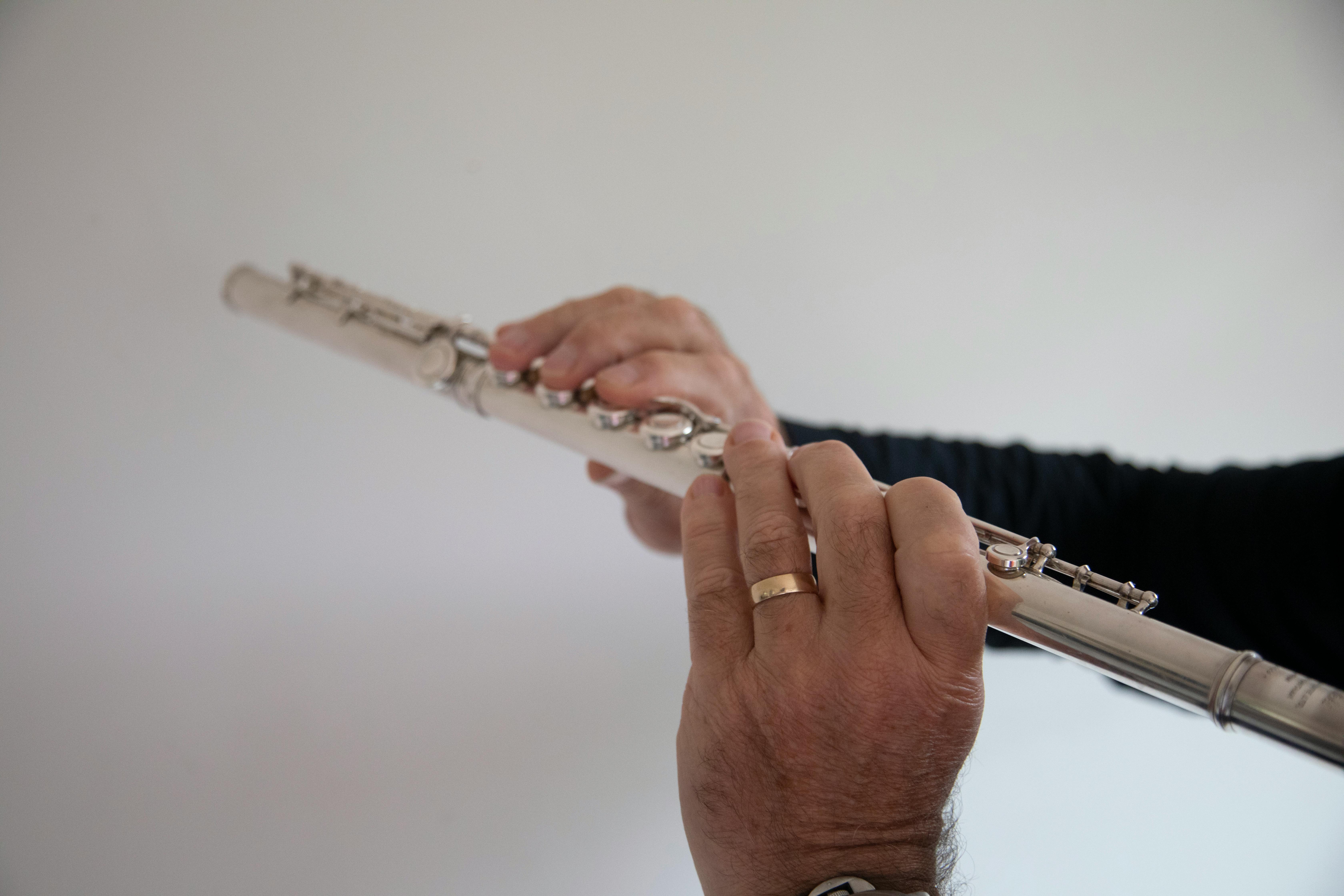 a person playing a flute