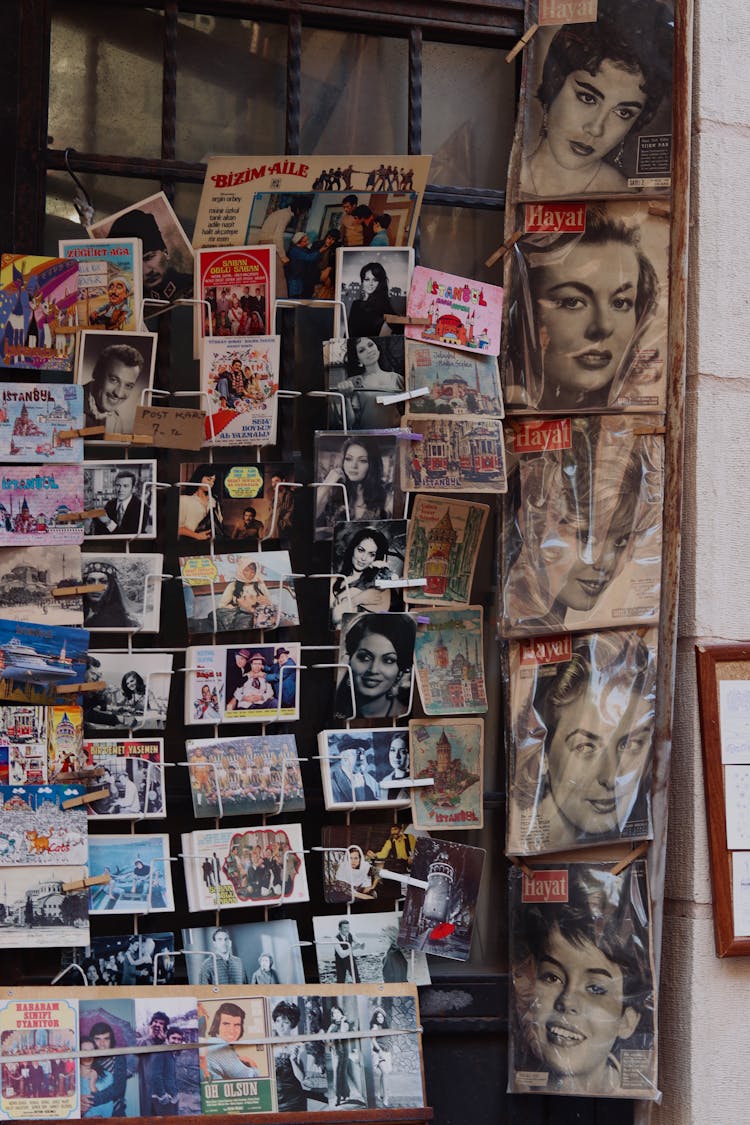 Old Photogrphs And Magazines On A Stand