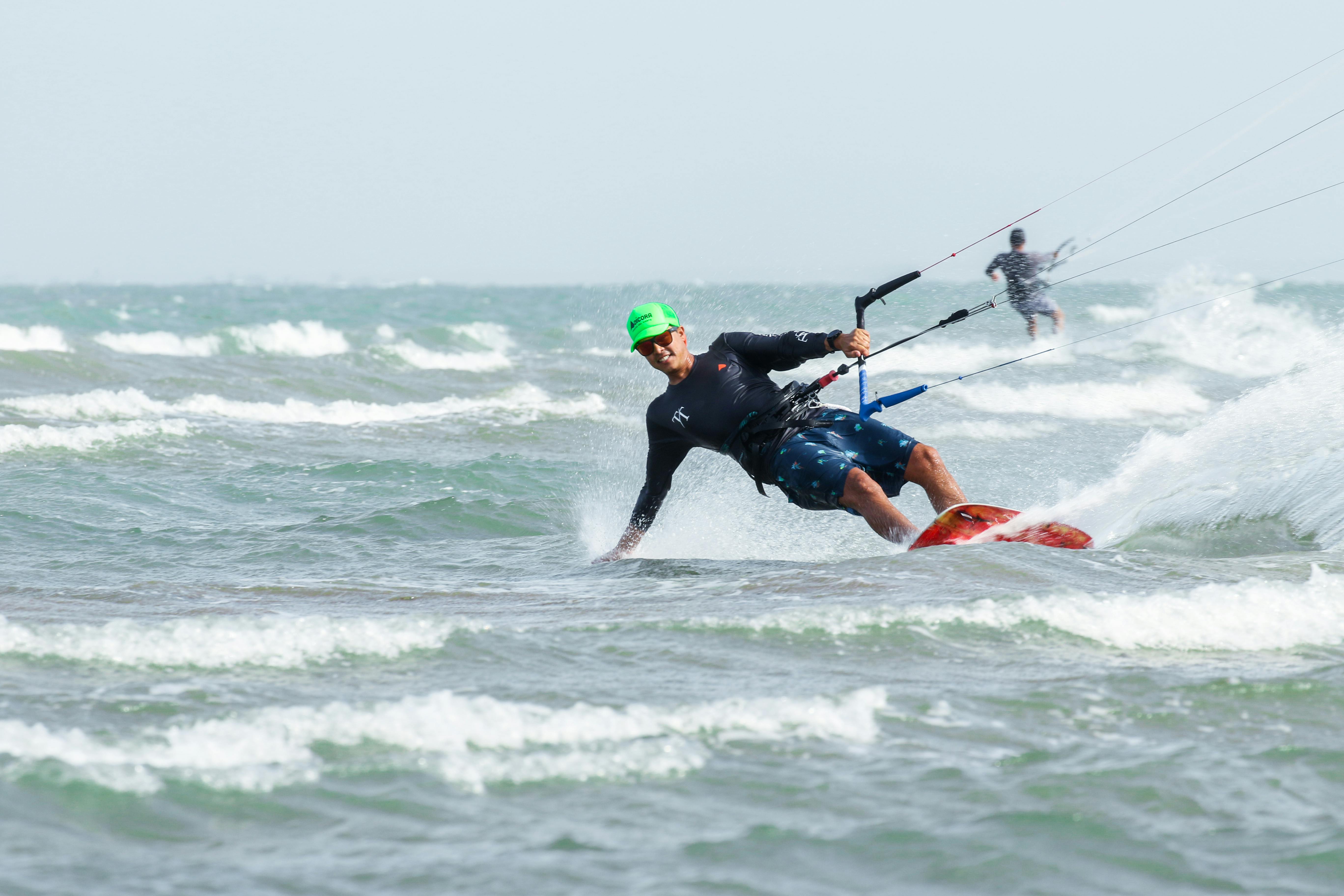 a man doing kitesurfing