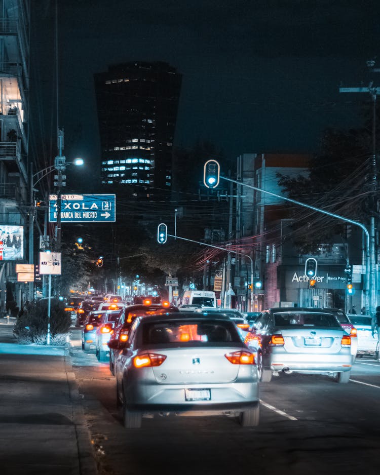 Cars On Road During Night Time