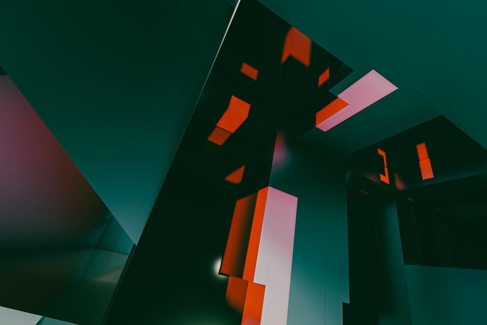 Abstract 3D geometric forms with amber accents on a dark background.