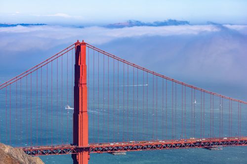 Free Aerial view of the Golden Gate Bridge amidst fog in San Francisco, USA. Stock Photo