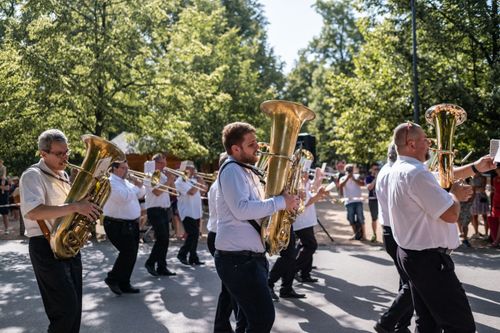 Free A lively marching band performs on the streets of Poděbrady, Czechia, showcasing brass instruments. Stock Photo
