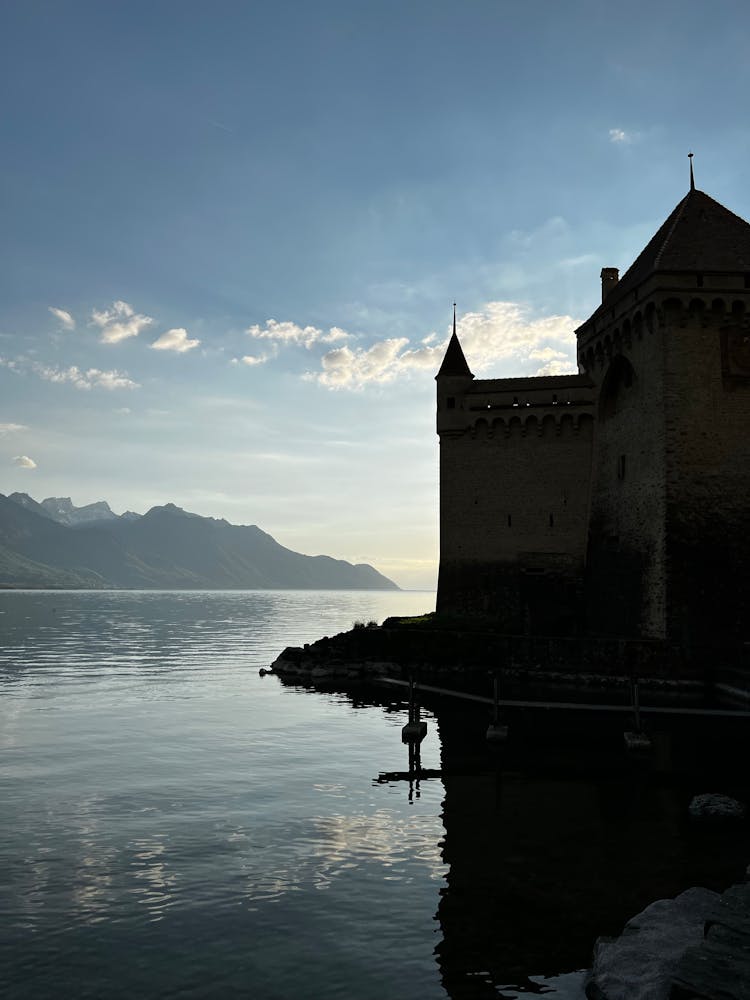 Silhouette Of A Castle Near A Lake