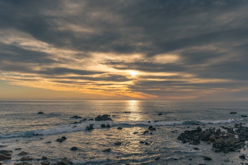 A Rocky Shore during Sunset