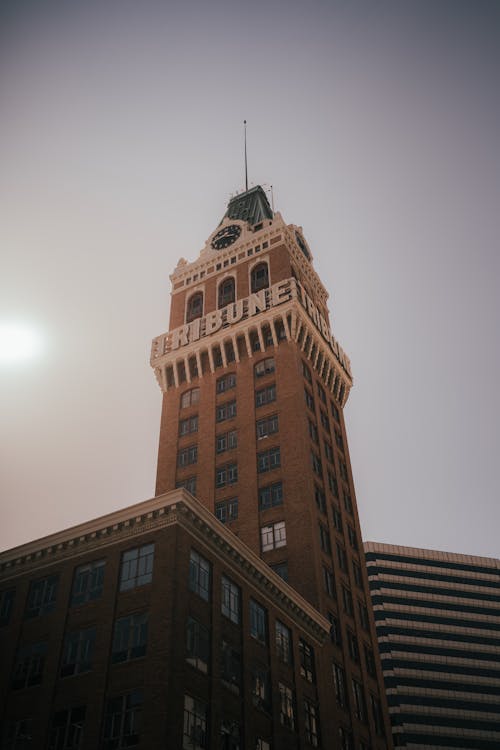 Low Angle View of Clock Tower of Urban Building