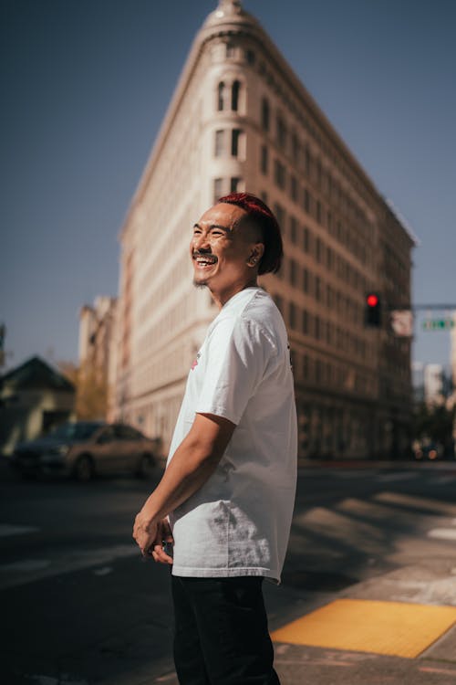 Urban Portrait of Laughing Man in T-shirt