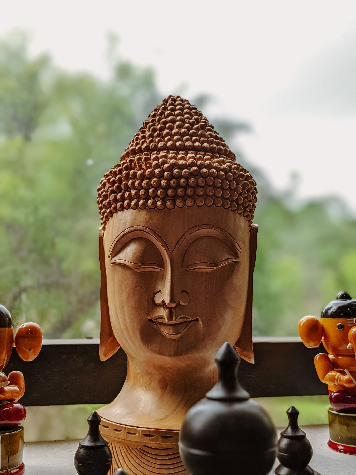 A carved stone Buddha - Khmer craftsmanship, Cambodia