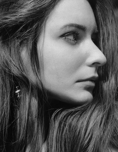 Black and white close-up portrait of a woman in Kyiv.