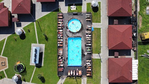 Drone Shot of Buildings near Swimming Pools