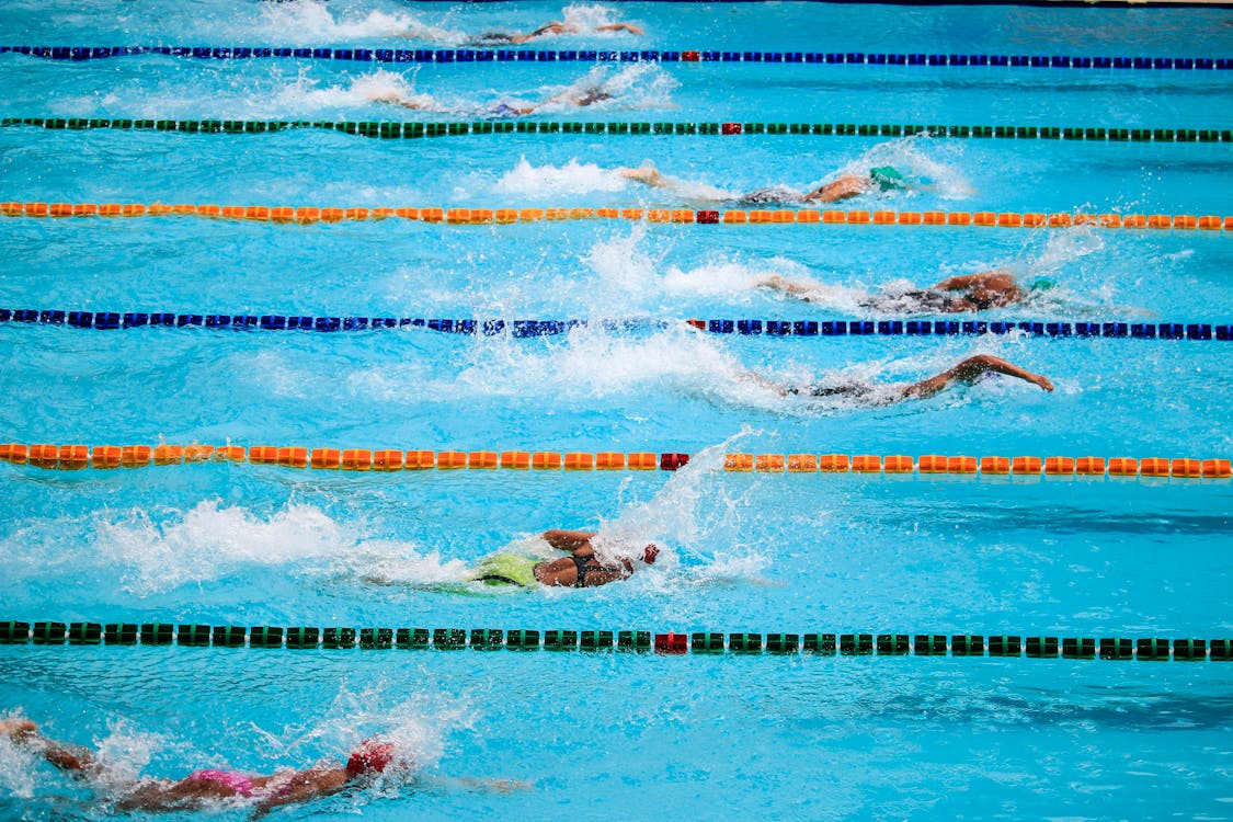 Free People Doing Swim Race Stock Photo