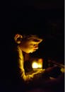 Portrait of a Boy Illuminated by a Light