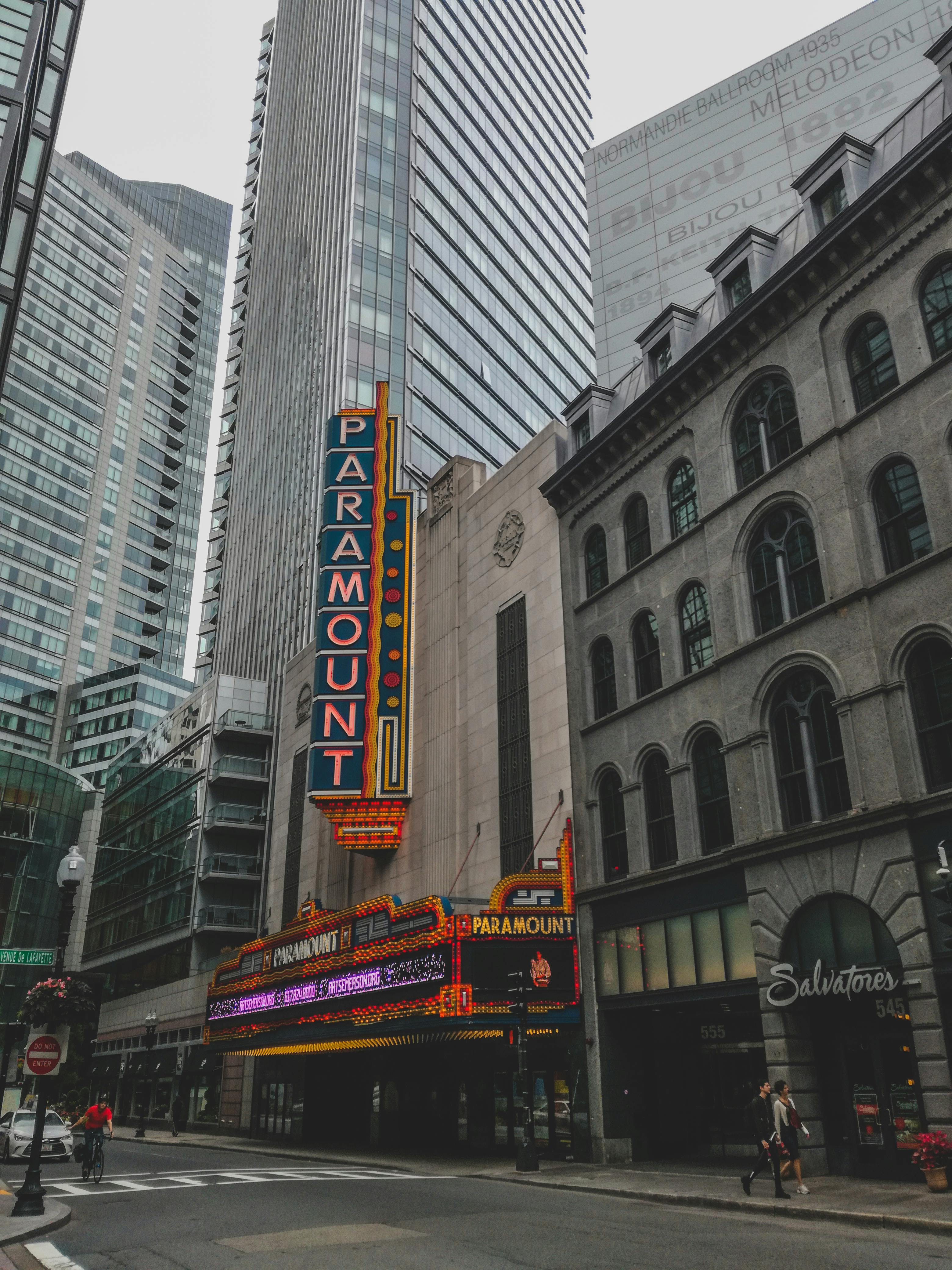 City view of Boston featuring the iconic Paramount Theatre sign and downtown architecture.