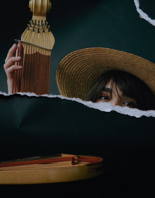 Torn Photo of a Woman with a Musical Instrument 