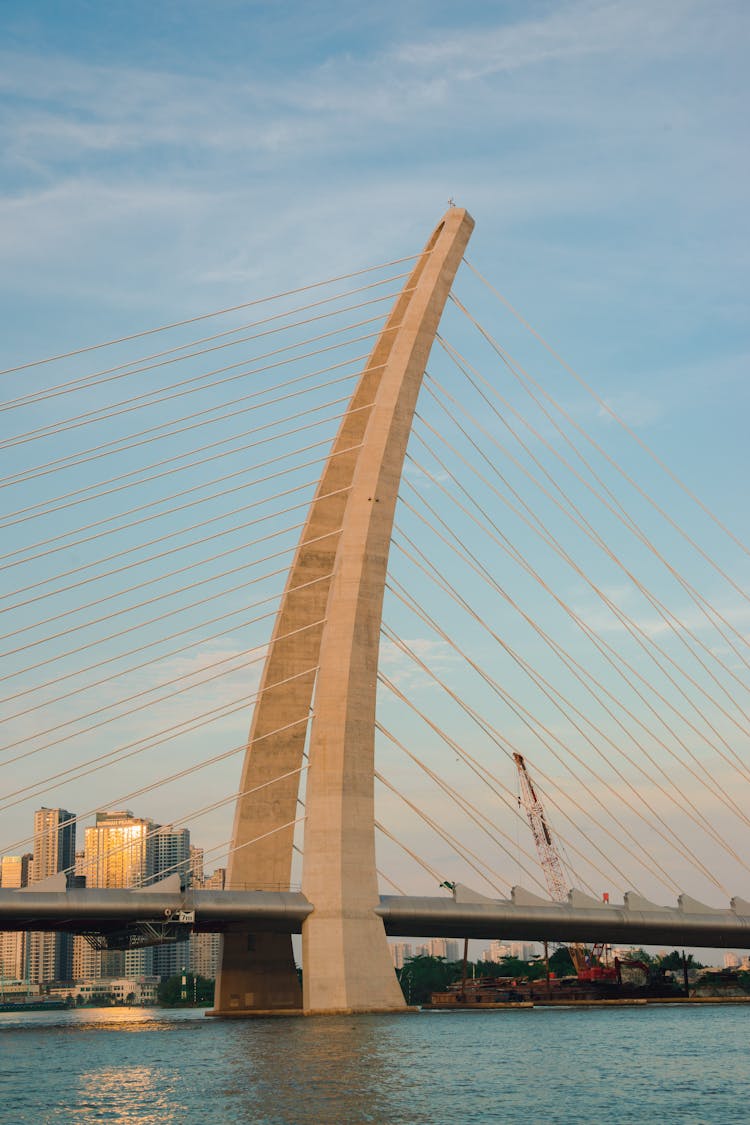 Saigon Water Bus In The Sunset With Thu Thiem Bridge And Landmark 81