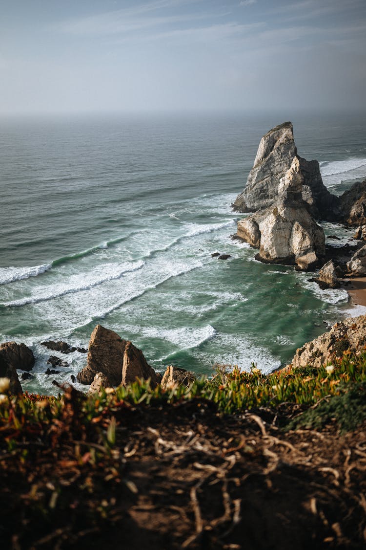 Cliffs On Beach Near Ocean