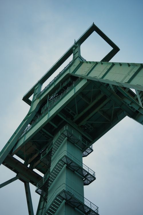 Free A towering steel structure photographed from below, showcasing industrial design against a clear sky. Stock Photo