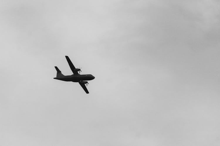 Silhouette Of An Airplane Flying