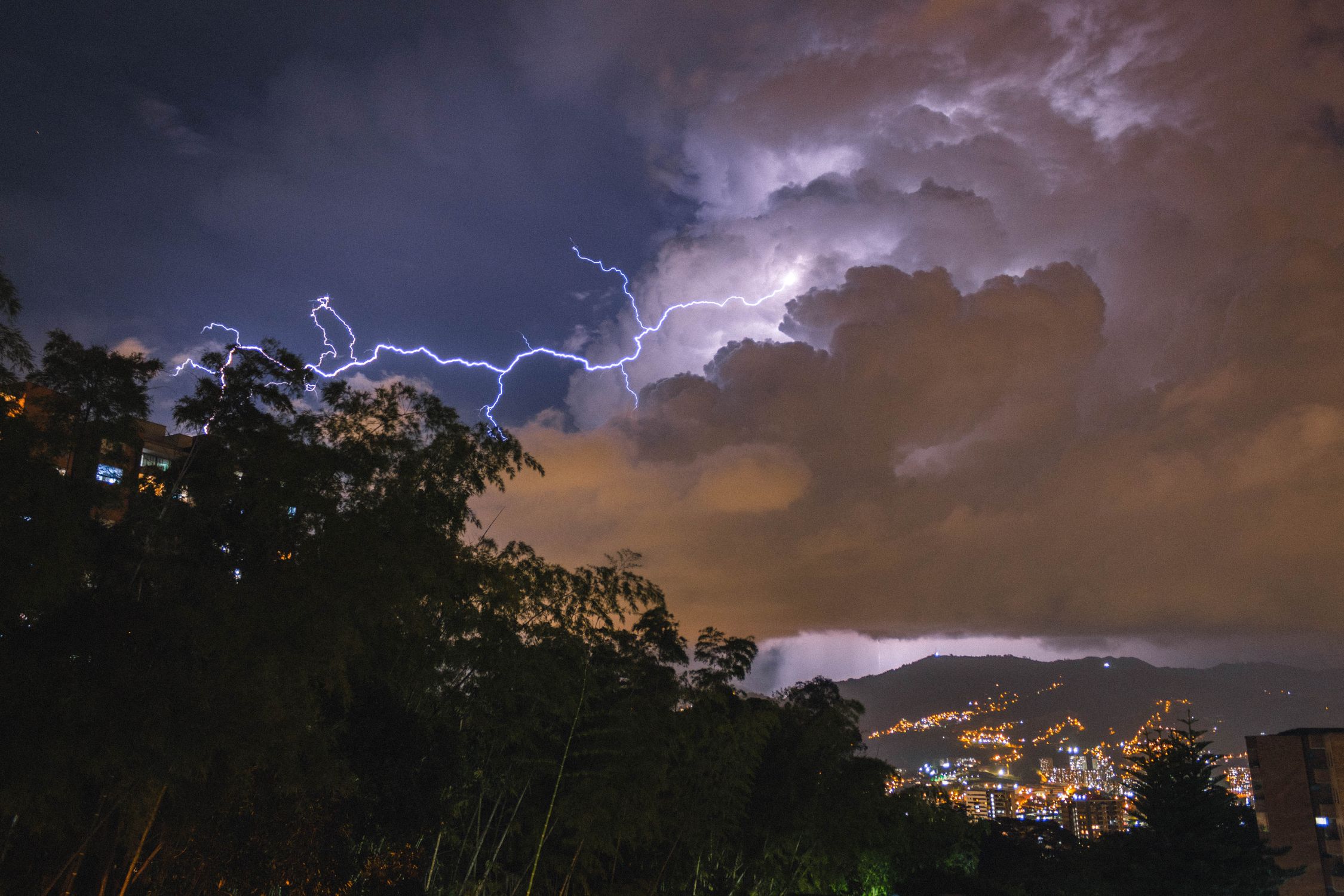 Dramatic Lightning Over Cityscape at Night · Free Stock Photo