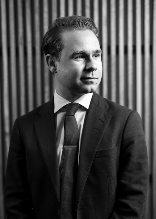 Man in Black Suit Jacket and Tie