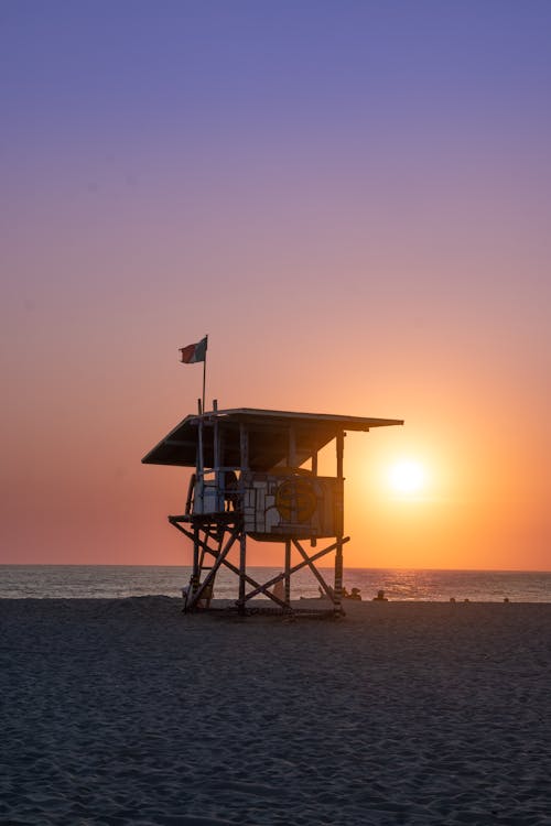 Lifeguard Tower and Sea at Sunset