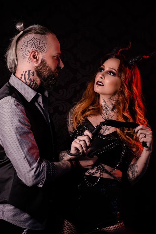 Free Dark and gothic couple with tattoos and costumes, ideal for Halloween themes. Stock Photo