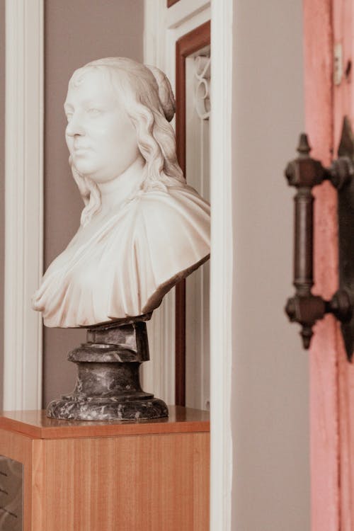 A Head Bust of  Woman on a Wooden Table