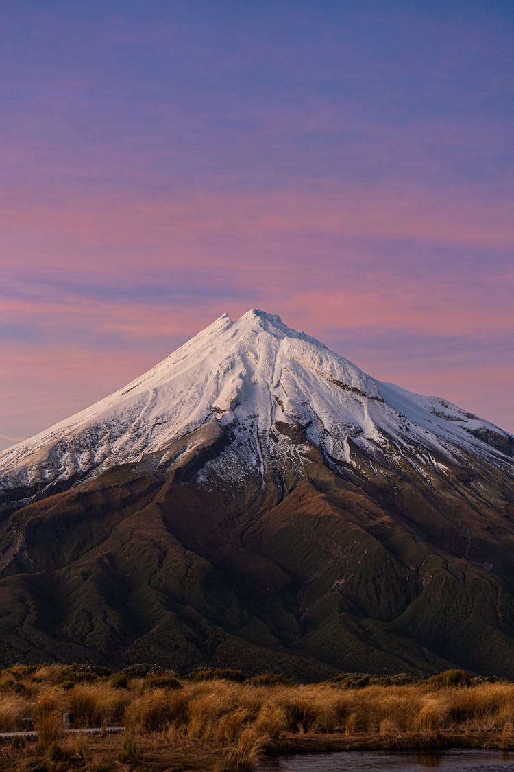 The Snowcapped Mt. Taranaki Volcano In Taranaki, New Zealand