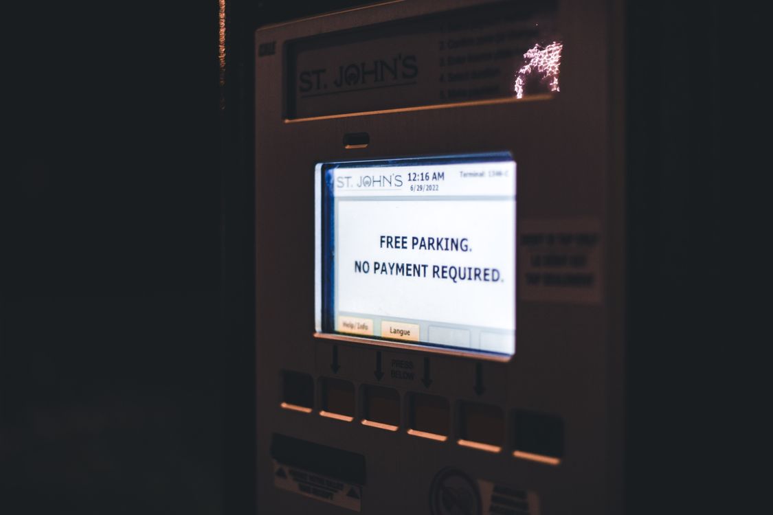 /a-free-parking-advisory-on-a-machine-s-screen-What Are the Costs and Fees for German Citizenship/TerraTern