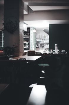 Atmospheric dimly lit kitchen interior with a rustic charm, showcasing warm home ambiance.