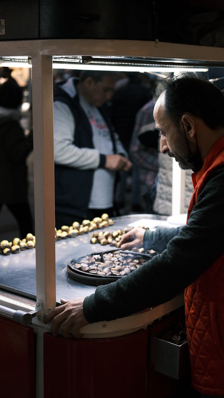 Man Selling Food On Street