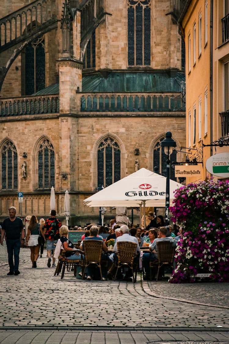 People Eating Outside Restaurant