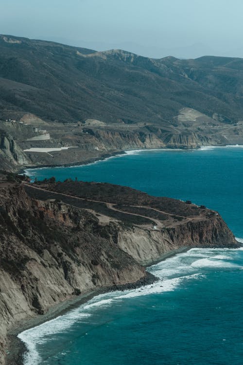 Foto profissional grátis de abismo, costa, fotografia aérea