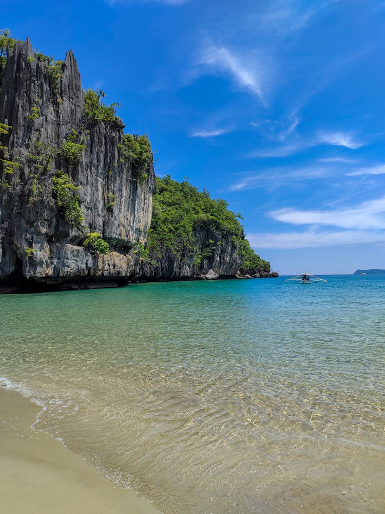 Scenic View Of A Beach And Rock Formations In Palawan Philippines