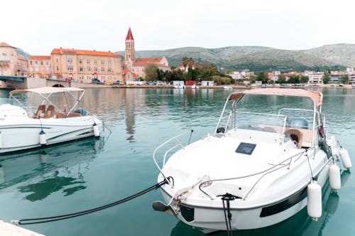Boat in the Harbour and the View of the Trogir Cathedral, Trogir, Croatia