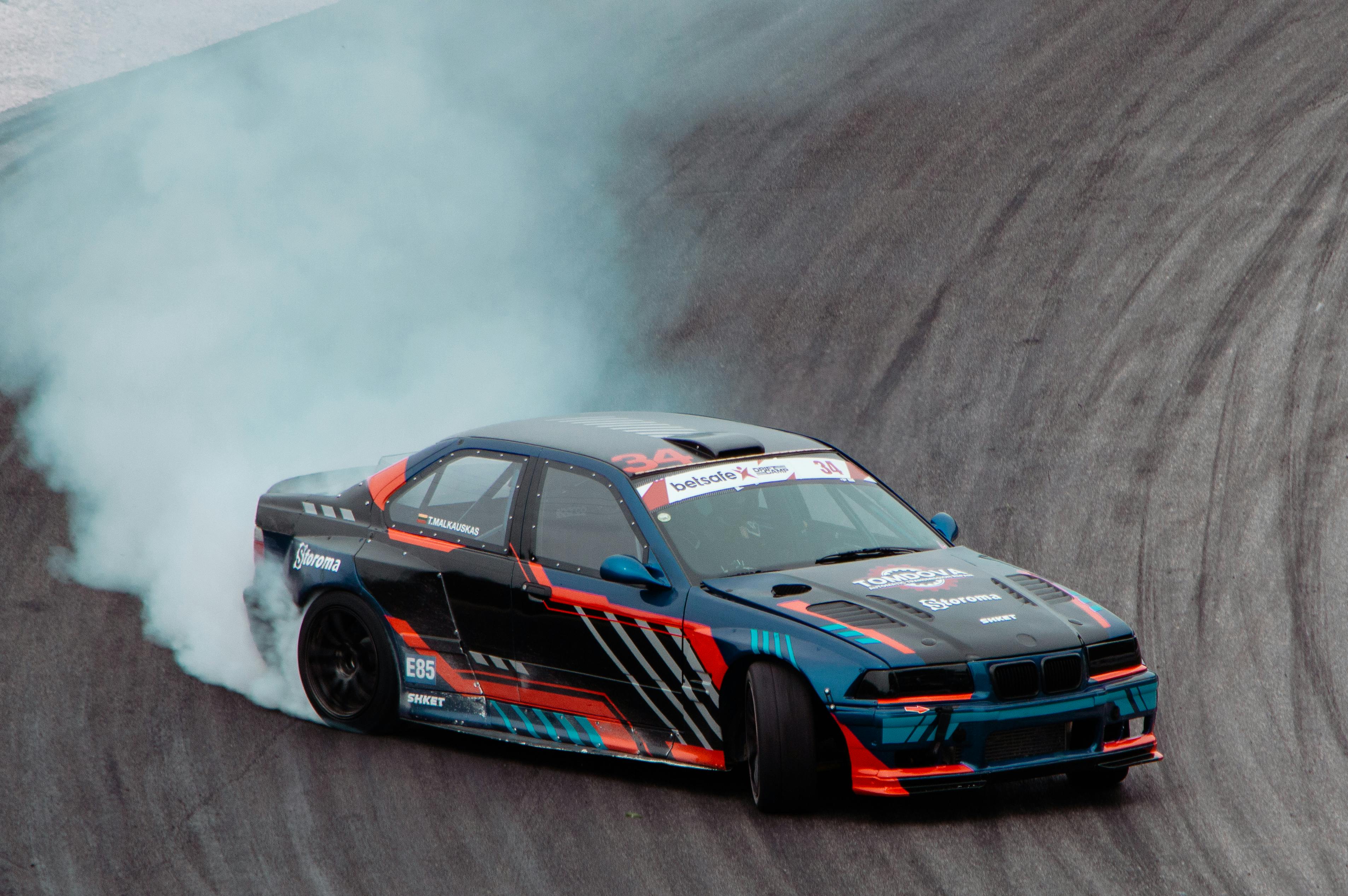 Close-up of a Race Car Drifting at a Race Track · Free Stock Photo