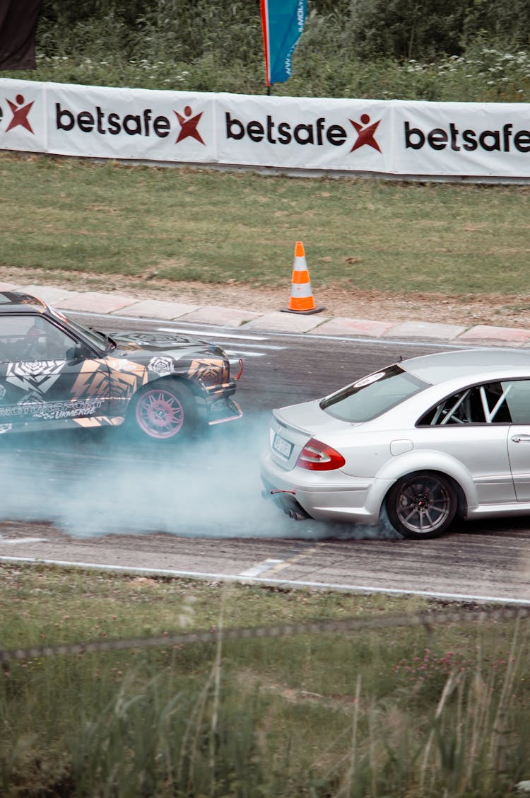 Cars Racing On A Track