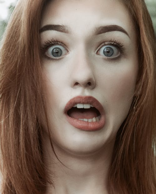 Close-up Photo of a Shocked Woman's Face