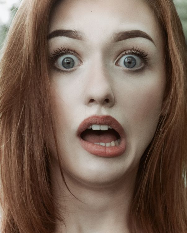 Close-up Photo of a Shocked Woman's Face ยท Free Stock Photo