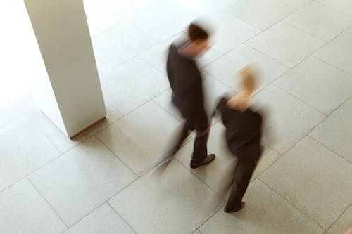 People Walking on Sidewalk